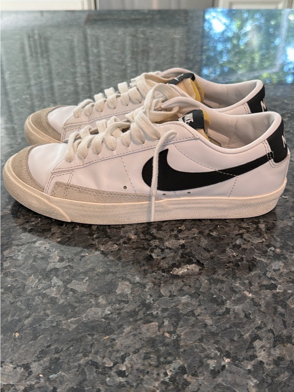 Nike Women’s White Sneakers with Black Swoosh, Size 8
